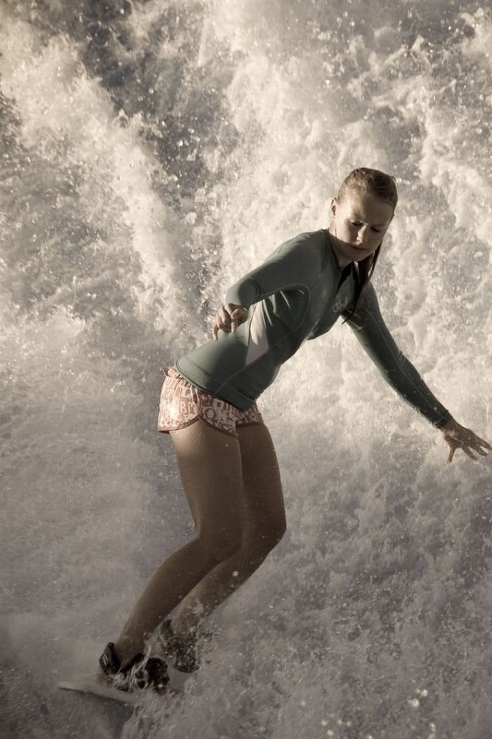 young surfing girl