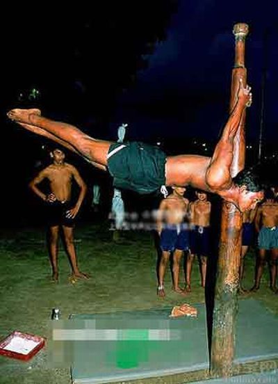 Mallakhamb, Asana  (yoga) on a pole