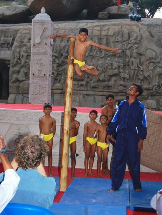 Mallakhamb, Asana  (yoga) on a pole