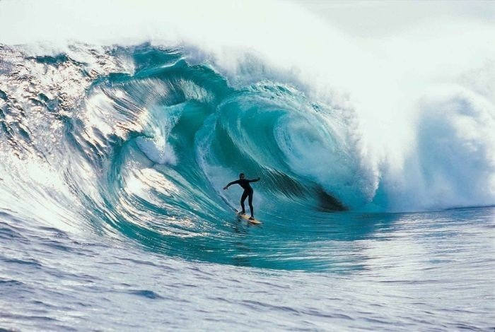 surfing huge waves