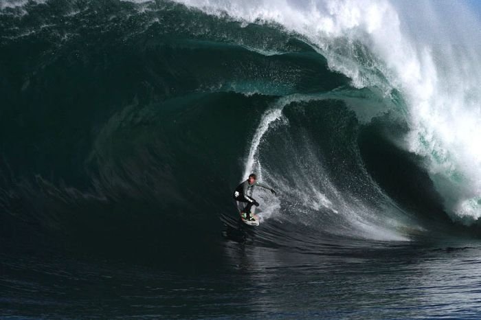 surfing huge waves