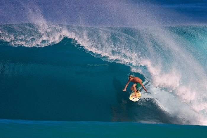 surfing huge waves