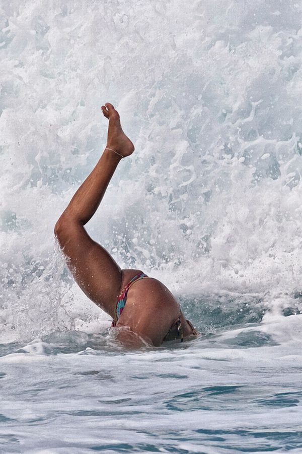 young surfing girl