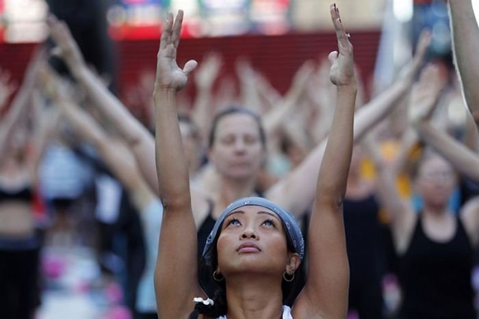Yoga at Times Square, New York City, United States