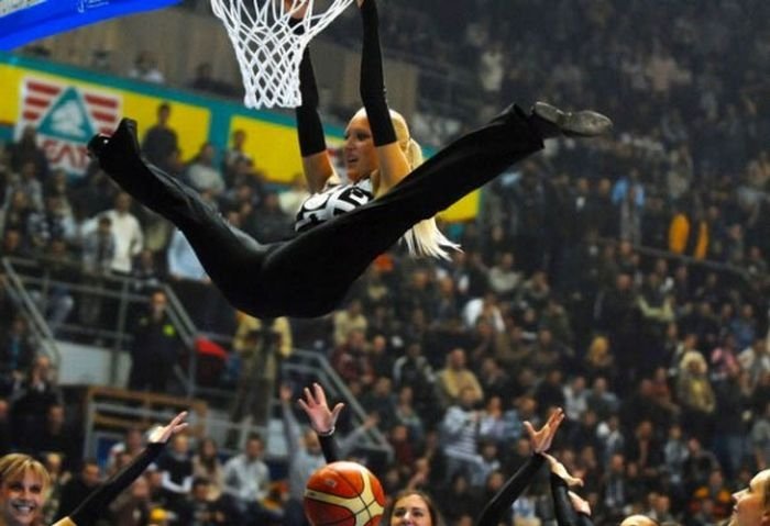 NBA girl making a slam dunk