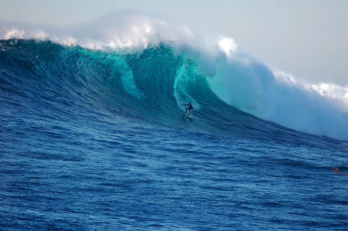 surfing huge waves