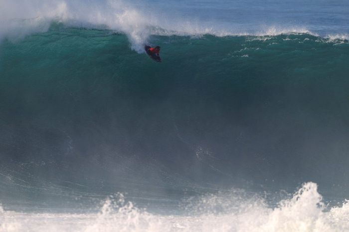 surfing huge waves