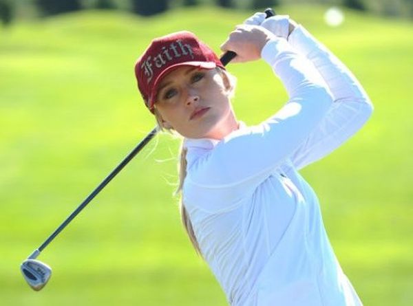 girl playing golf