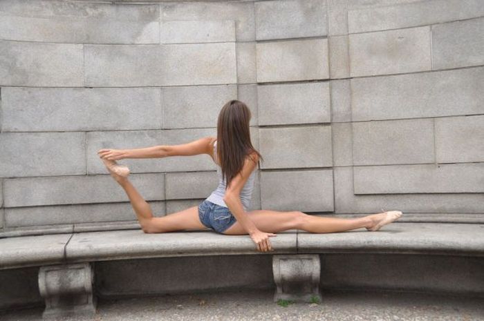 young teen ballet girl doing flexible gymnastic exercises