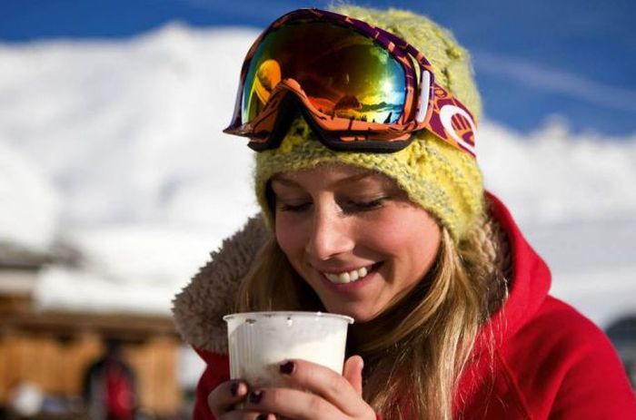 young winter girl on snow