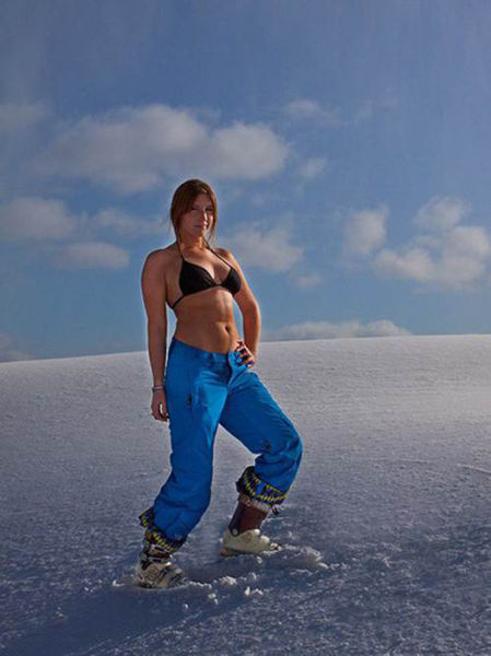 young winter girl on snow