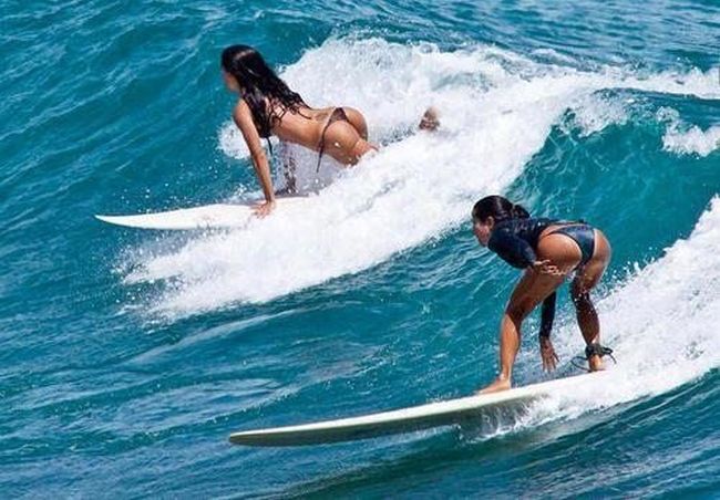 young surfing girl