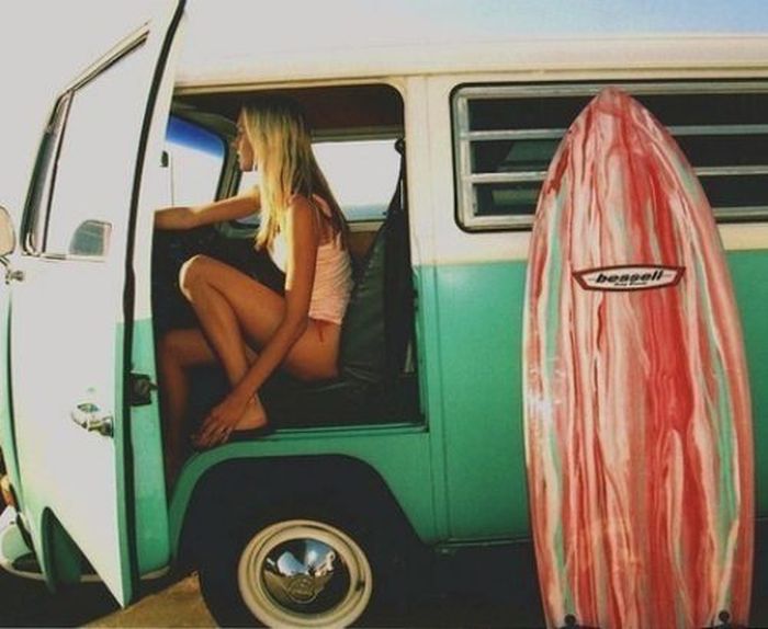 young surfing girl