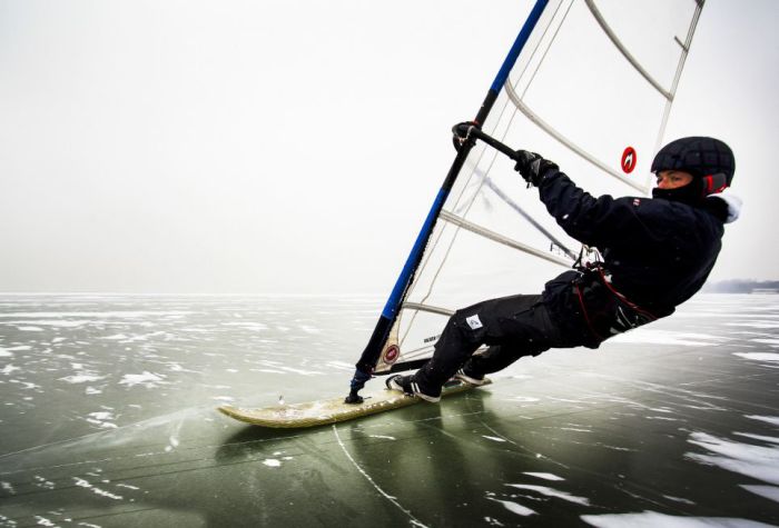 ice windsurfing on a frozen lake