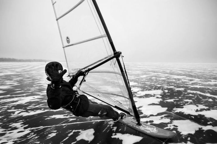 ice windsurfing on a frozen lake