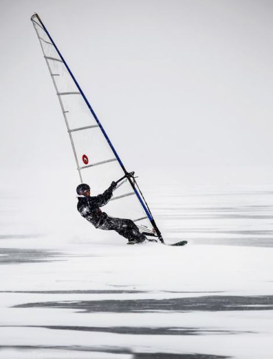 ice windsurfing on a frozen lake