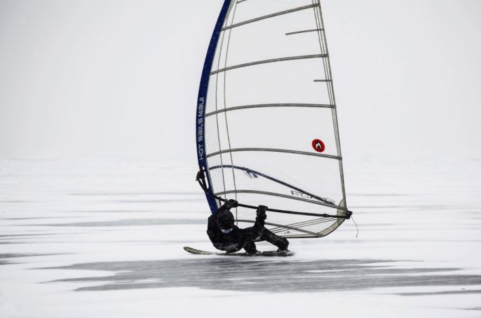 ice windsurfing on a frozen lake