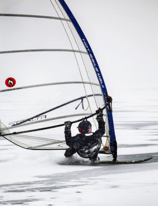 ice windsurfing on a frozen lake