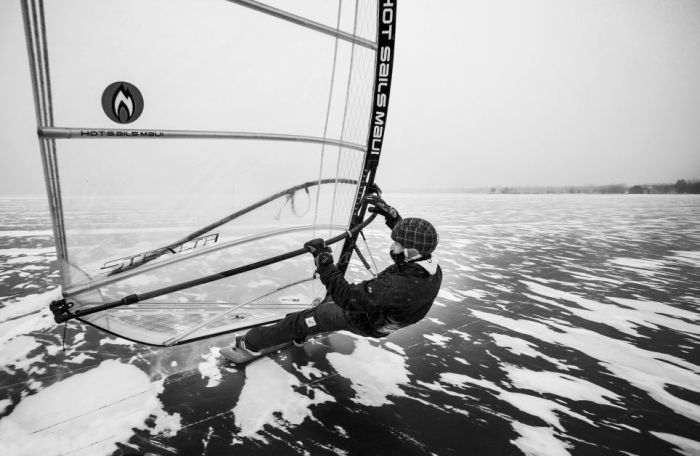 ice windsurfing on a frozen lake