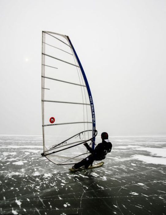 ice windsurfing on a frozen lake