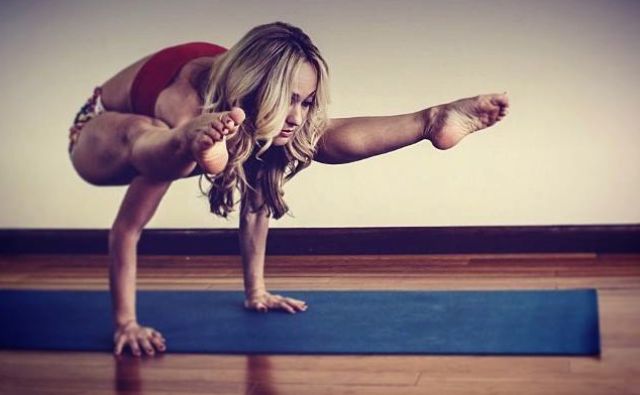 Kino MacGregor, girl practicing yoga poses