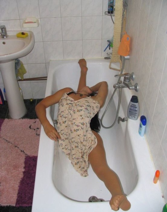 young brunette girl doing flexible gymnastics at home