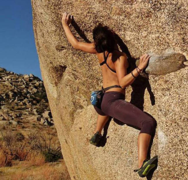 young rock climbing girl