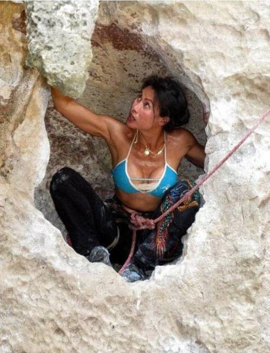 young rock climbing girl