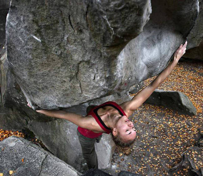 young rock climbing girl