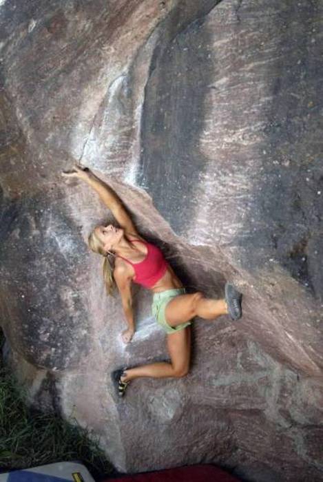 young rock climbing girl