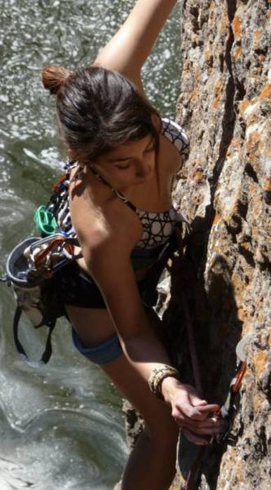 young rock climbing girl