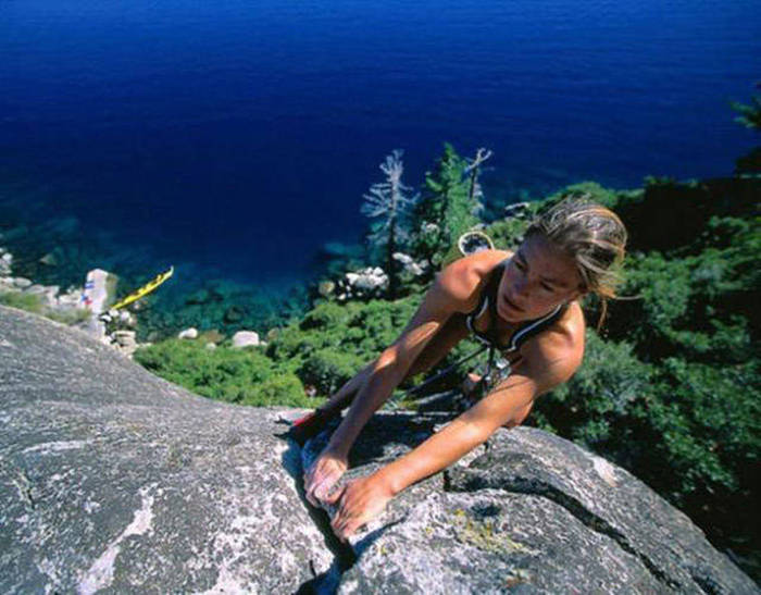 young rock climbing girl