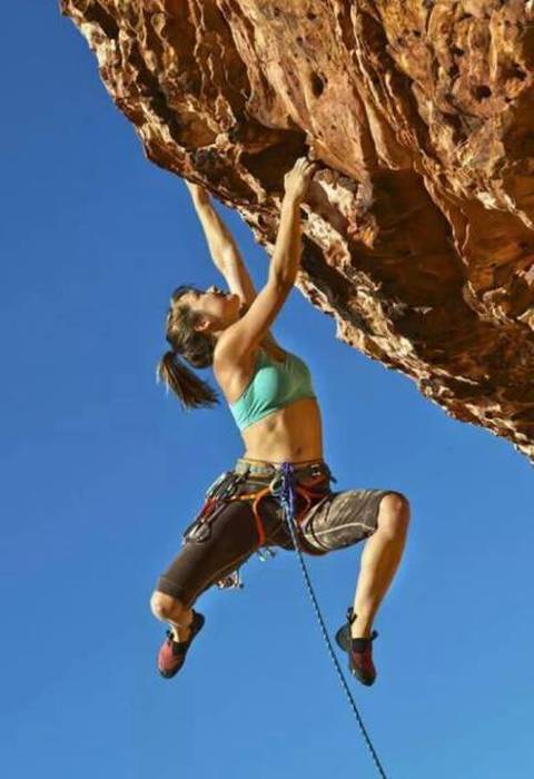 young rock climbing girl