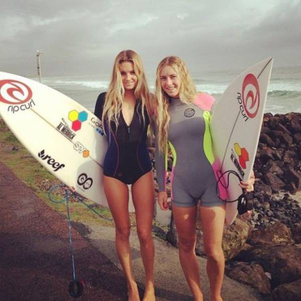 young surfing girl