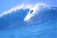 Sport and Fitness: young surfing girl