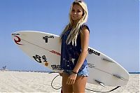 Sport and Fitness: young surfing girl