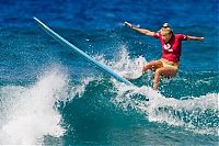 Sport and Fitness: young surfing girl