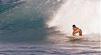 Sport and Fitness: young surfing girl