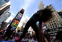 Sport and Fitness: Yoga at Times Square, New York City, United States