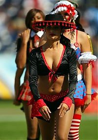 Sport and Fitness: NFL cheerleader girls in halloween costumes