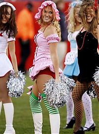 Sport and Fitness: NFL cheerleader girls in halloween costumes