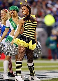 Sport and Fitness: NFL cheerleader girls in halloween costumes