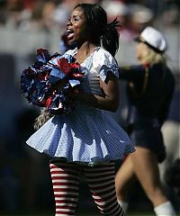 Sport and Fitness: NFL cheerleader girls in halloween costumes