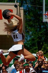 Sport and Fitness: NBA girl making a slam dunk