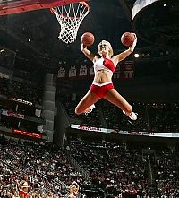 Sport and Fitness: NBA girl making a slam dunk