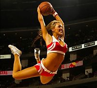 Sport and Fitness: NBA girl making a slam dunk