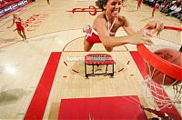 Sport and Fitness: NBA girl making a slam dunk