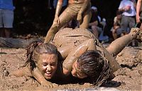 Sport and Fitness: bikini girls mud wrestling