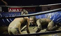 Sport and Fitness: bikini girls mud wrestling