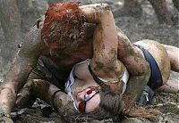 Sport and Fitness: bikini girls mud wrestling